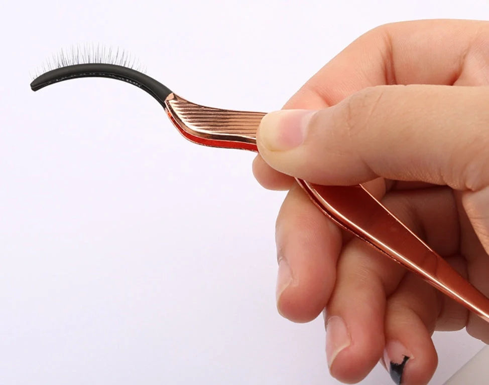 Rose gold false eyelash curler aid for flawless, curled lashes