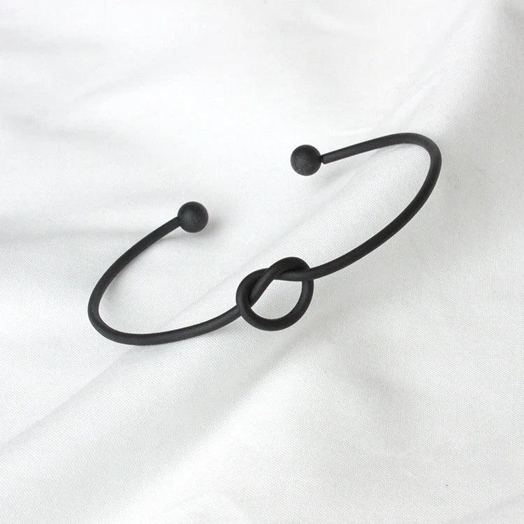 Elegant knotted O-type metal openwork bracelet in various colours