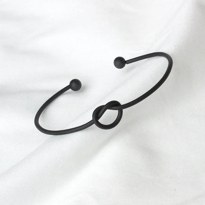 Elegant knotted O-type metal openwork bracelet in various colours