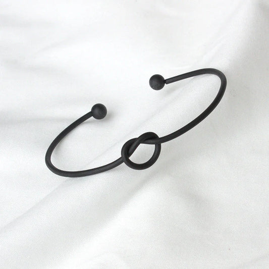 Elegant knotted O-type metal openwork bracelet in various colours