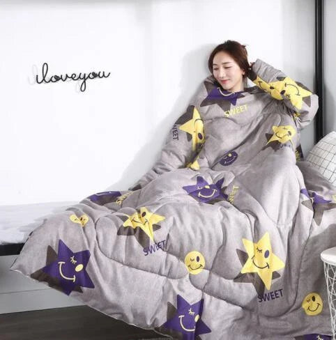 Cozy quilted lounger with sleeves in various colors and sizes, perfect for year-round indoor comfort and relaxation.