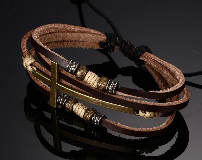 Rugged leather cross bracelet with durable construction and adjustable fit, a versatile accessory for the modern British gentleman