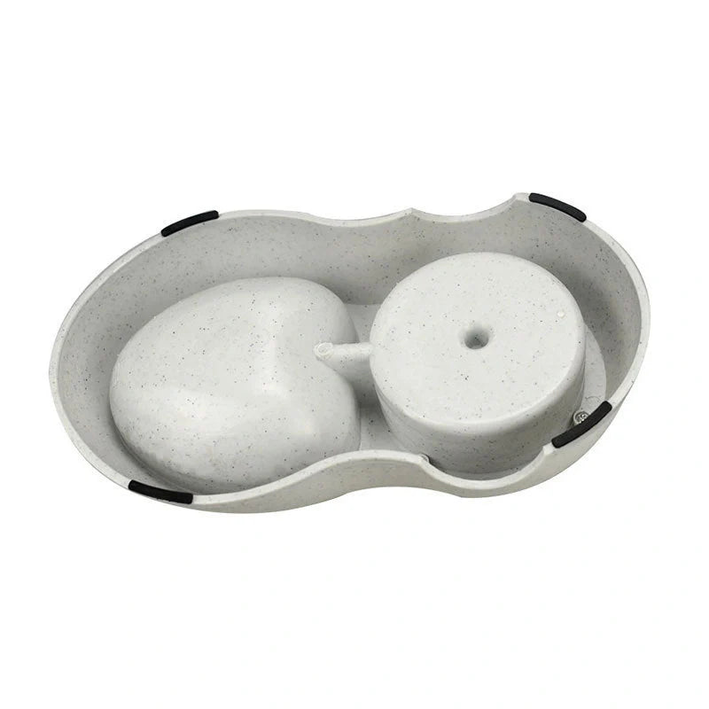Automatic pet feeder and water dispenser for cats and dogs, available in green