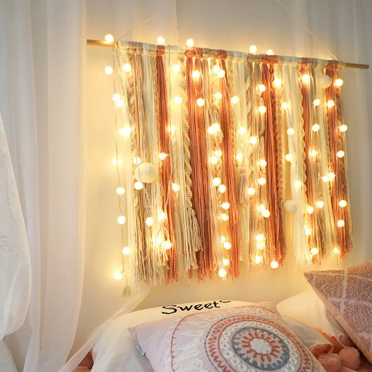 Battery-operated LED curtain garland with plastic stars and fur balls for festive decoration