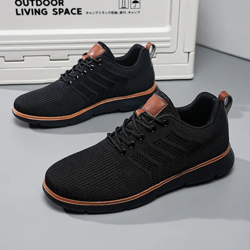 Men's black lace-up mesh sneakers with round toe design