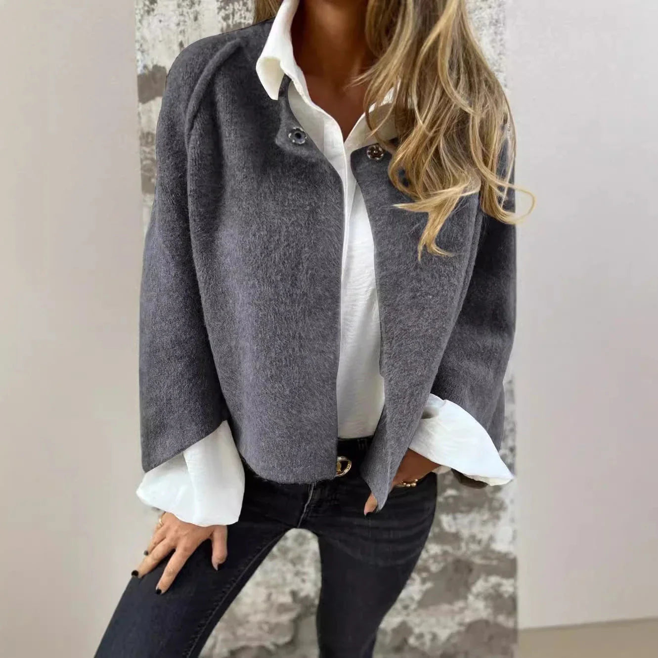 A stylish and comfortable batwing sleeve cardigan made with luxurious imitation cashmere fabric, available in a variety of colors.