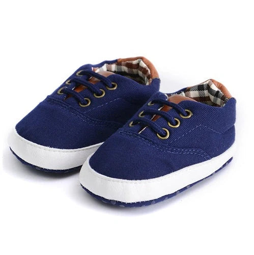 Solid colour baby canvas shoes with soft bottom and front strap in sizes 11cm to 13cm