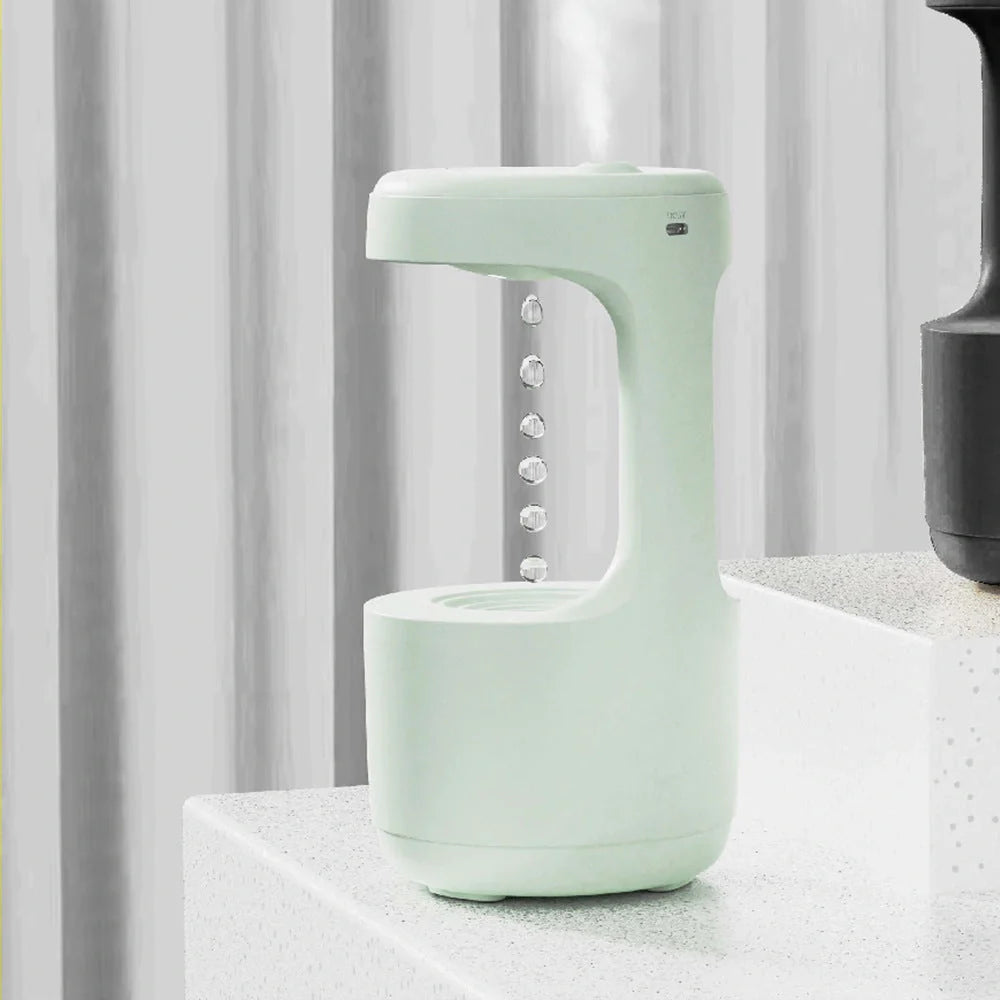 Anti-gravity humidifier with LED display and aroma diffuser in white, green, and black