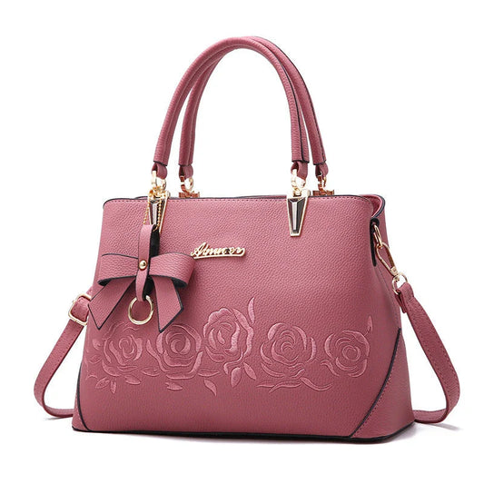 Stylish faux leather ladies' handbag in various colours, featuring a versatile single shoulder design and spacious interior