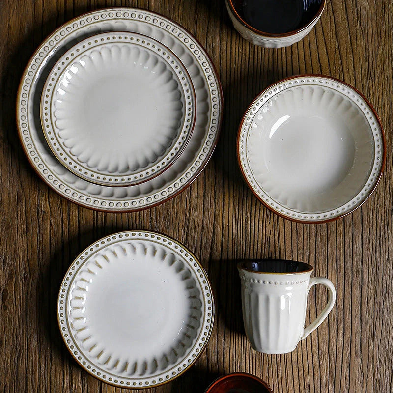 A set of 6 exquisite white ceramic plates, perfect for serving a variety of dishes in style