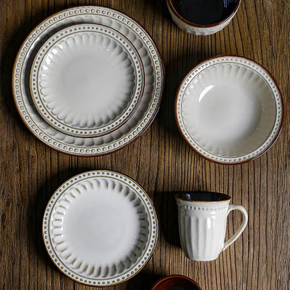 A set of 6 exquisite white ceramic plates, perfect for serving a variety of dishes in style