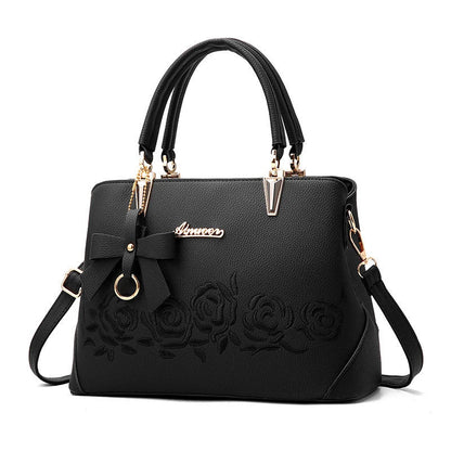 Stylish faux leather ladies' handbag in various colours, featuring a versatile single shoulder design and spacious interior