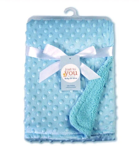 Premium plush baby blanket in various colours, perfect for swaddling, strolling, and creating a cosy nursery environment
