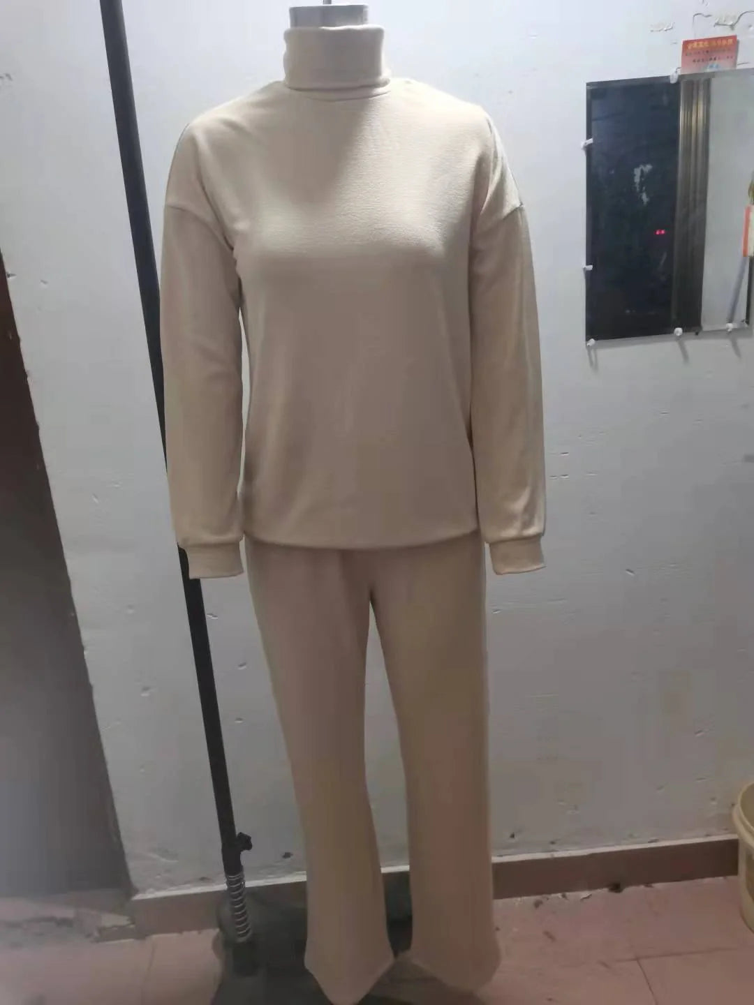 Women's casual turtleneck sweater and drawstring pants set in cotton-polyester blend