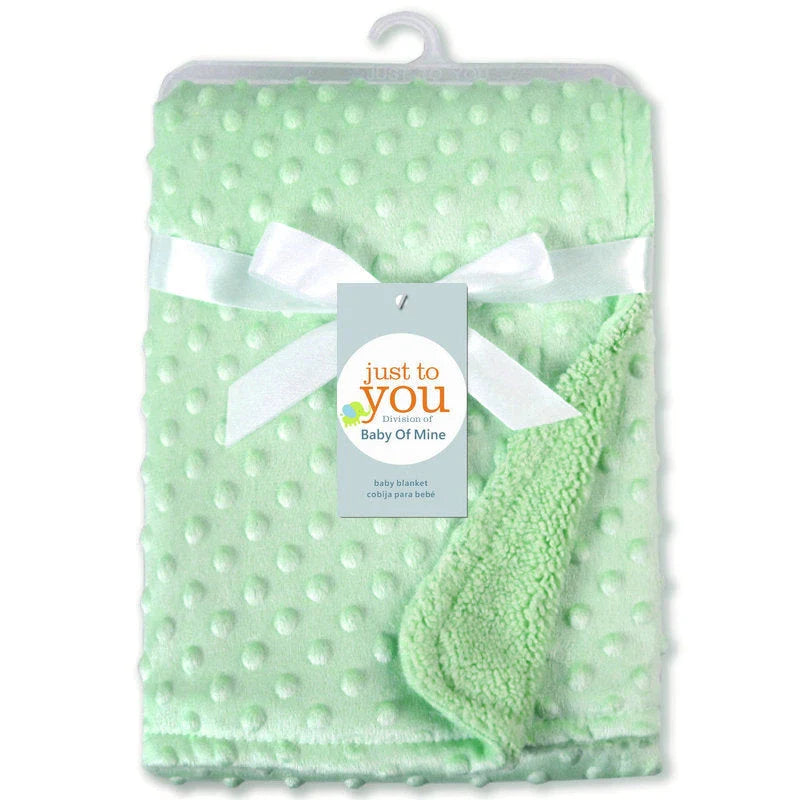 Premium plush baby blanket in various colours, perfect for swaddling, strolling, and creating a cosy nursery environment