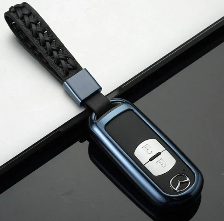 Aluminium alloy key case for Mazda with CNC engraving in sapphire, blue, grey, and rose gold