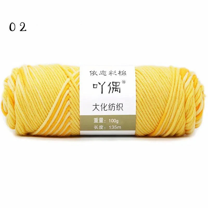 Luxurious gradient milk cotton yarn balls in a variety of vibrant colours, perfect for knitting, weaving, and other textile crafts.