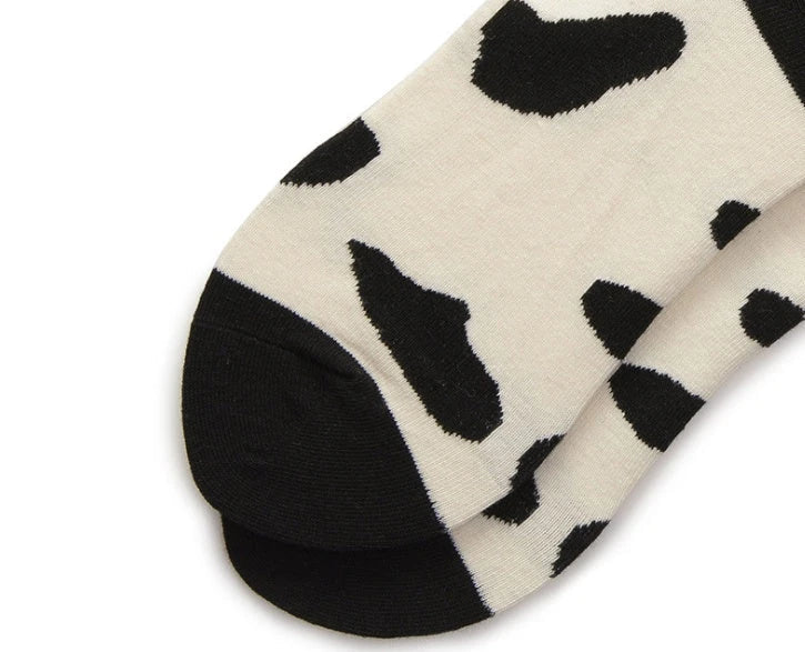 Stylish Dalmatian-inspired cotton crew socks with a premium blend of polyester, spandex, and cotton for all-day comfort and flexibility.