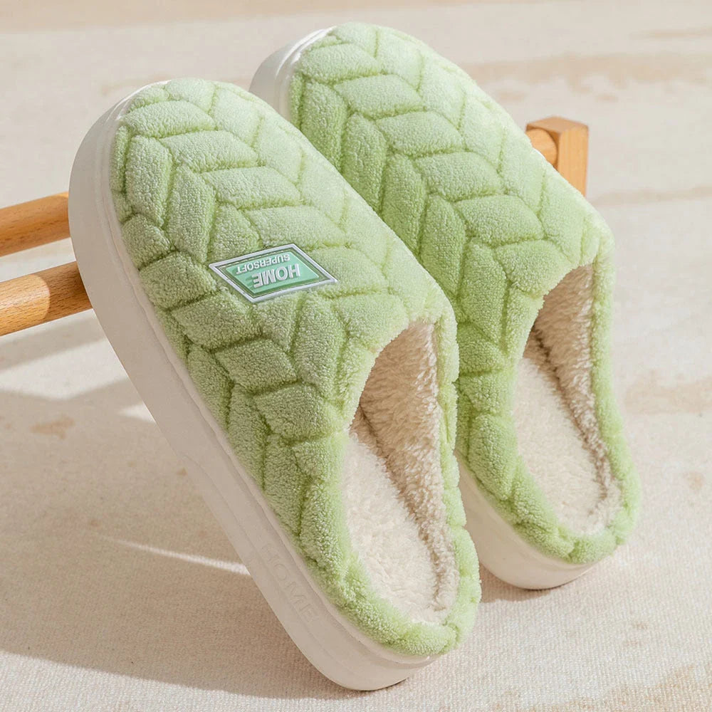 Cosy plush slippers in a variety of vibrant colours, featuring a soft fleece lining and durable non-slip sole for maximum comfort and stability.