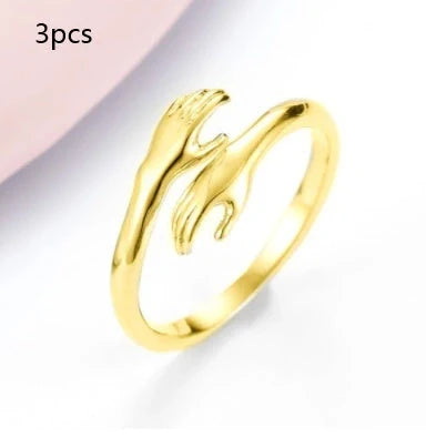 Adjustable Alloy Hands Hug Ring in silver and gold, stylish unisex jewelry