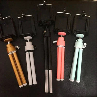 Mini aluminium tripod stand for digital cameras and mobile phones, adjustable with 3D panning and tilting capabilities