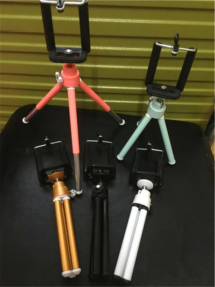 Mini aluminium tripod stand for digital cameras and mobile phones, adjustable with 3D panning and tilting capabilities