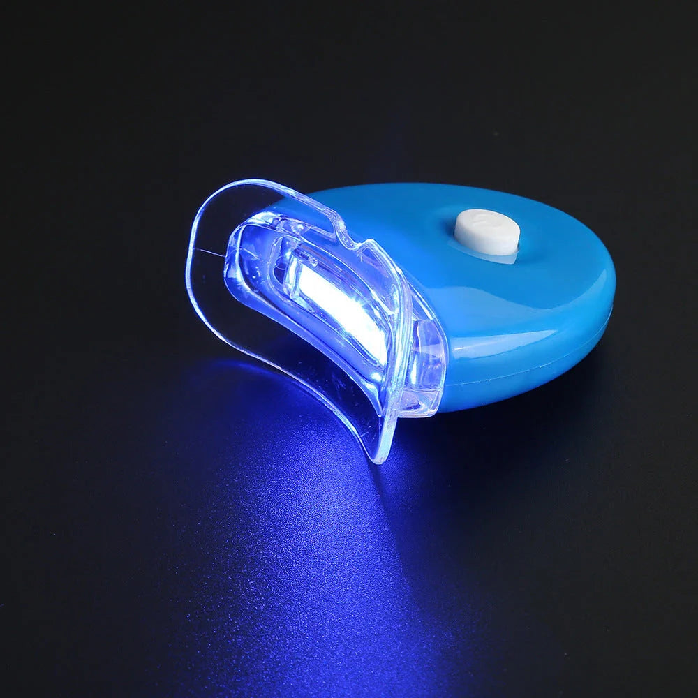 Premium blue LED teeth whitening lamp for on-the-go use, featuring compact, portable design and intelligent light technology.