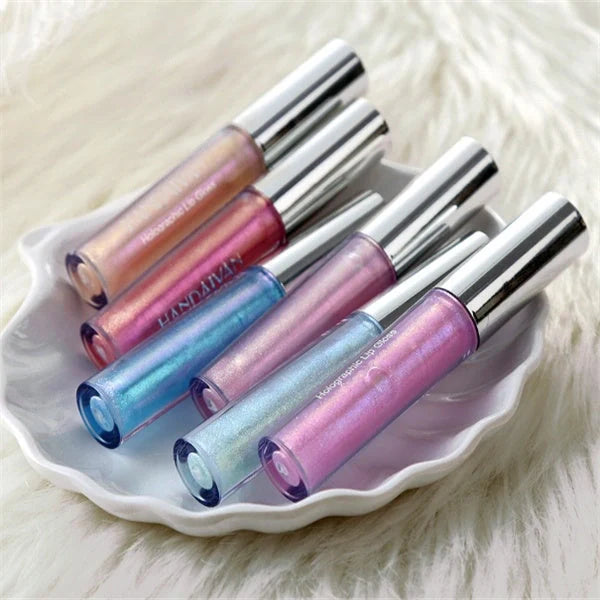 Polarized lip gloss in six vibrant shades, showcasing high-shine finish and vitamin E enrichment