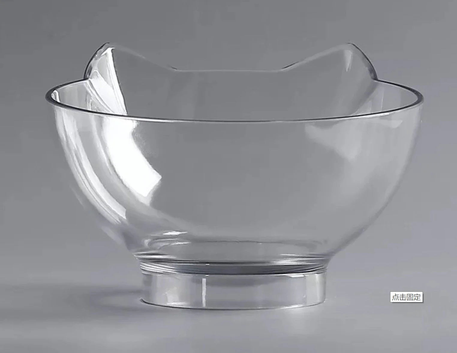 Inclined transparent cat food bowl with a gently sloped base and ergonomic design for whisker-friendly dining