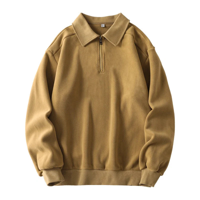 Premium fleece half-zip hoodie in black, haze green, and apricot yellow colours, featuring a tailored design and ribbed details for a refined look.