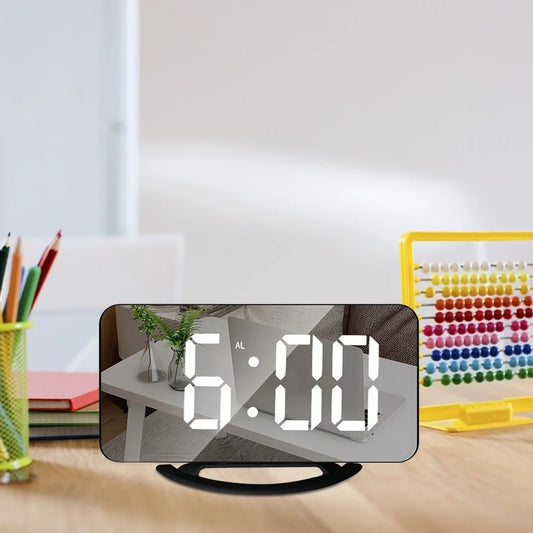Digital mirror clock with LED display and dual USB ports on a desk