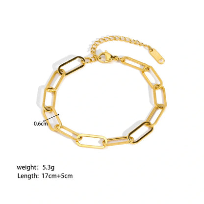 Stainless steel bracelet with real gold treatment in various colours, featuring geometry shapes and ring elements