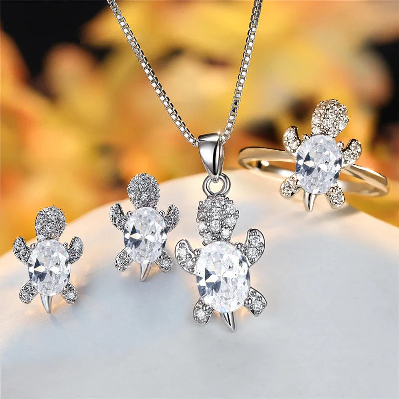 Stylish turtle pendant necklace with vibrant rainbow stones, perfect for women and children.