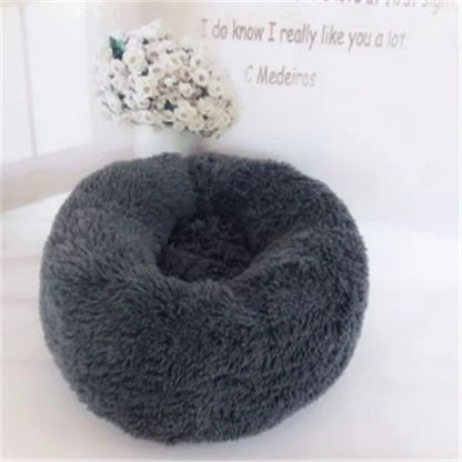 Cosy round plush cat mattress for winter warmth, available in various colours and sizes