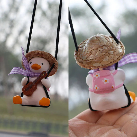 Car Swing Duck Ornament hanging from rearview mirror
