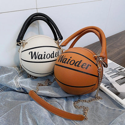 Basketball-shaped handbag in pink, white, black, or brown with adjustable chain shoulder strap