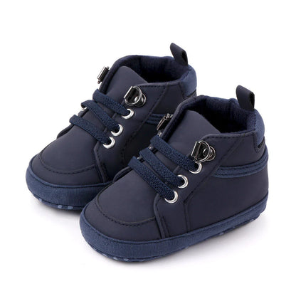 Soft-soled non-slip toddler shoes in brown, grey, and navy blue