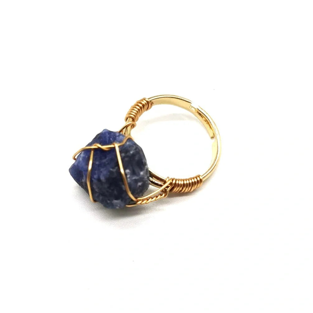 Handcrafted agate stone ring featuring an array of natural gemstones in various colours, with an adjustable design for a customized fit.