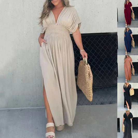 Chic bat-sleeve dress with v-neck, side slit, and elastic waist for comfortable summer style
