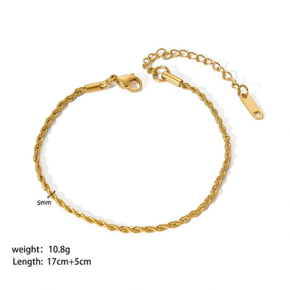 Stainless steel bracelet with real gold treatment in various colours, featuring geometry shapes and ring elements