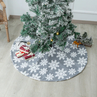 Soft, plush Christmas tree carpet skirt in red and grey, adding festive charm to a living room