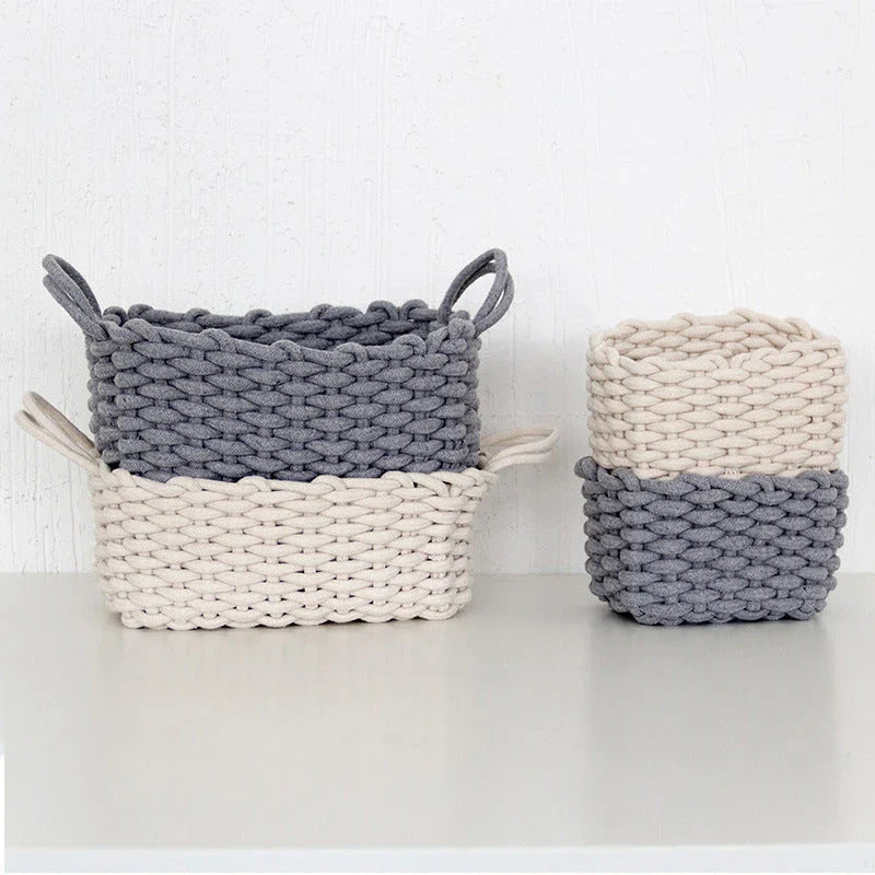 Hand-woven cotton rope storage basket in grey and white colours, featuring a minimalist nordic design for practical and stylish home organisation