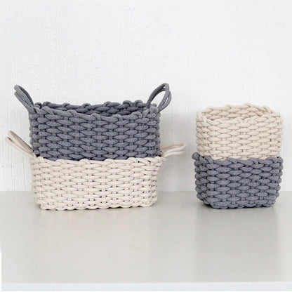 Hand-woven cotton rope storage basket in grey and white colours, featuring a minimalist nordic design for practical and stylish home organisation