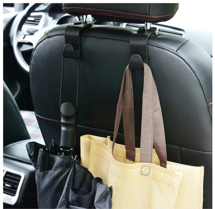 Auto Headrest Hangers in black, hooking onto car seat for organisation