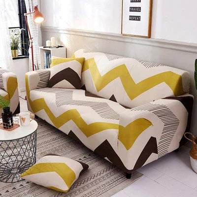 Stretchable geometric print sofa cover on a three-seater sofa