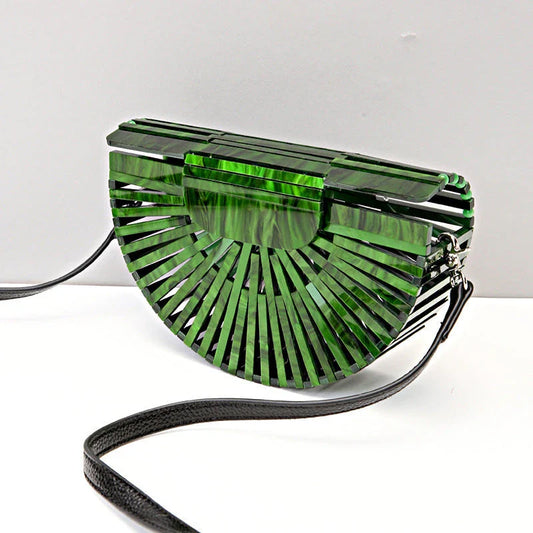 Stylish acrylic cross-body bag in various colors and strap designs, perfect for everyday use and fashion-forward British style.