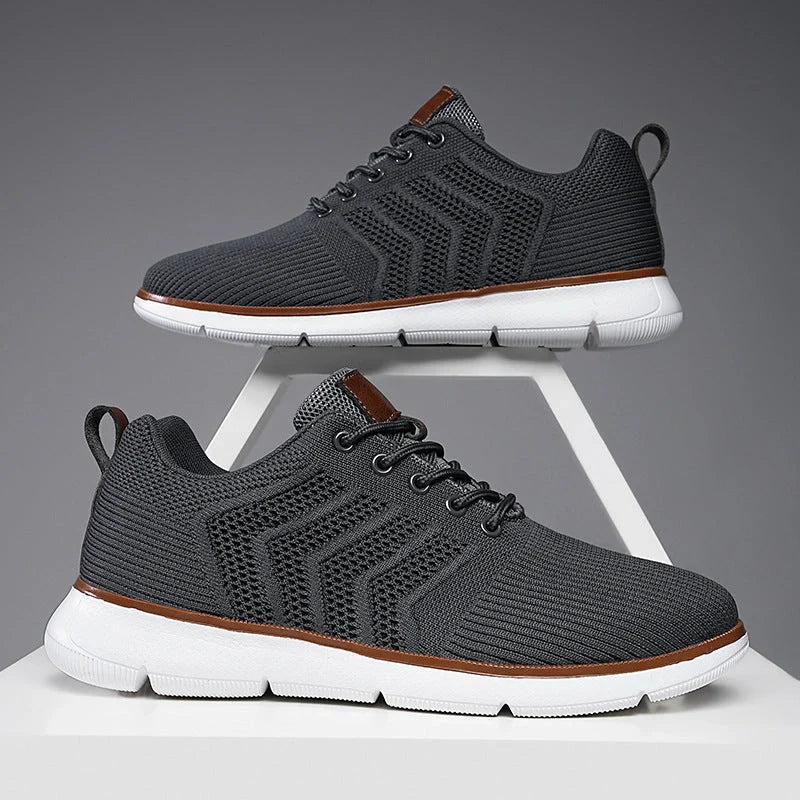 Men's black lace-up mesh sneakers with round toe design