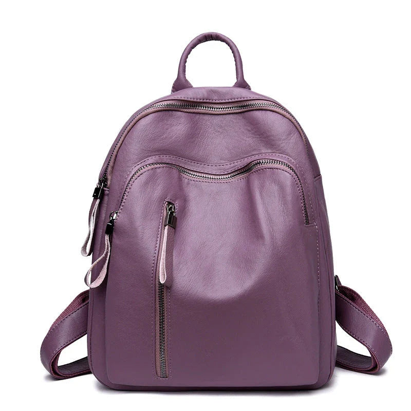 Stylish PU backpack in black, red, and blue colors with multiple compartments and adjustable straps for versatile and organized storage