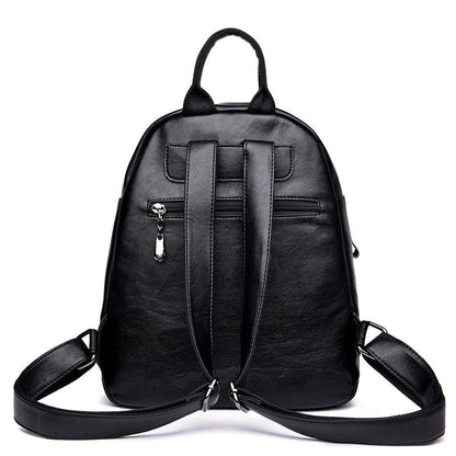 Stylish PU backpack in black, red, and blue colors with multiple compartments and adjustable straps for versatile and organized storage