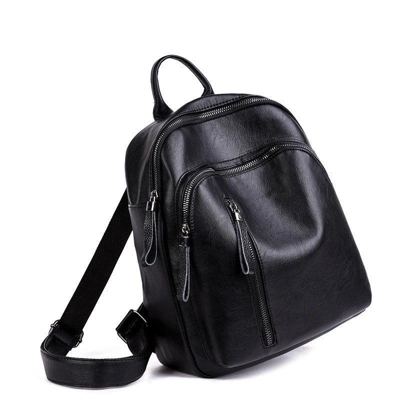 Stylish PU backpack in black, red, and blue colors with multiple compartments and adjustable straps for versatile and organized storage
